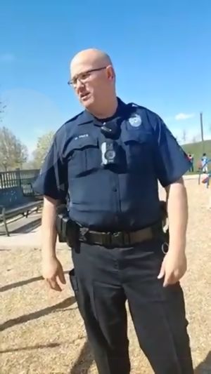 Bad Parents challenge a cop and his duties in front of their kids.              